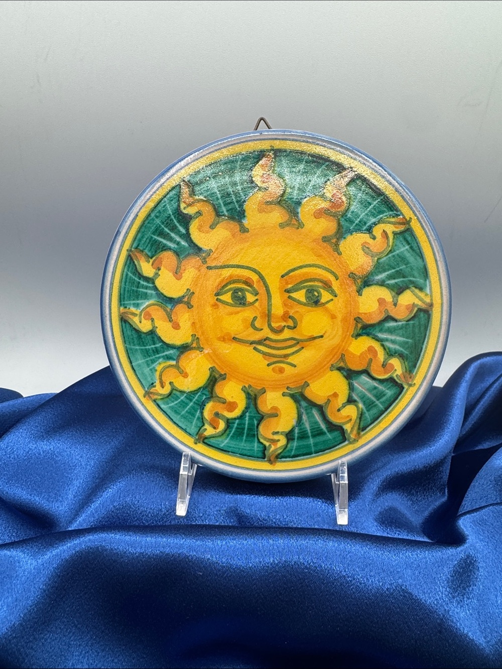 Vietri Yellow Sun Face Ceramic Wall Accent with Teal Background
